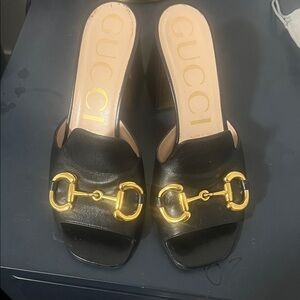 Gucci Black Platform Mules with Gold Detailing